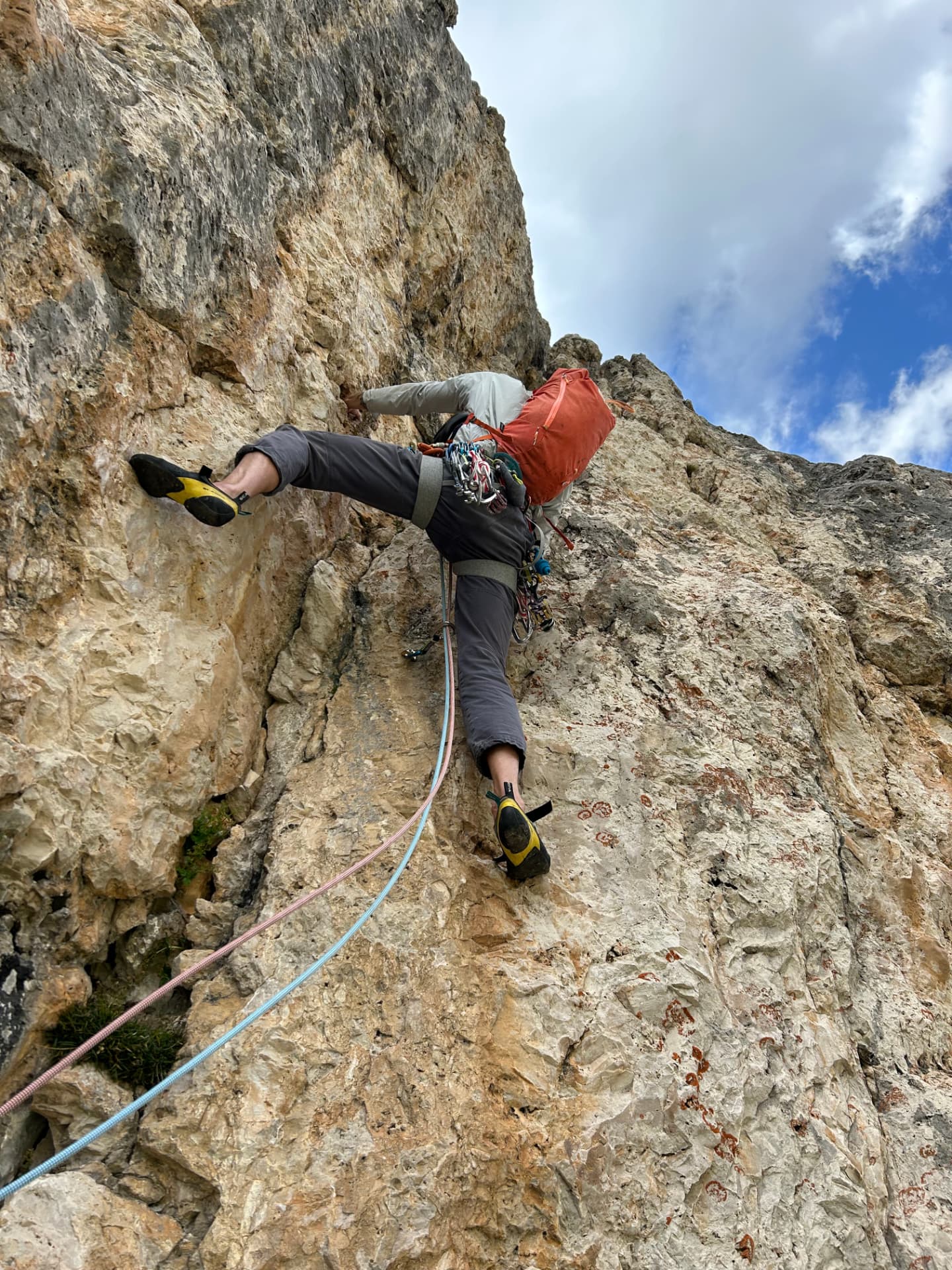Climber on Dolomite rock during a classic multi-pitch route